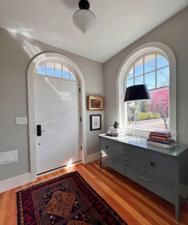 The rennovation replaced the old front porch with this new interior entry space
